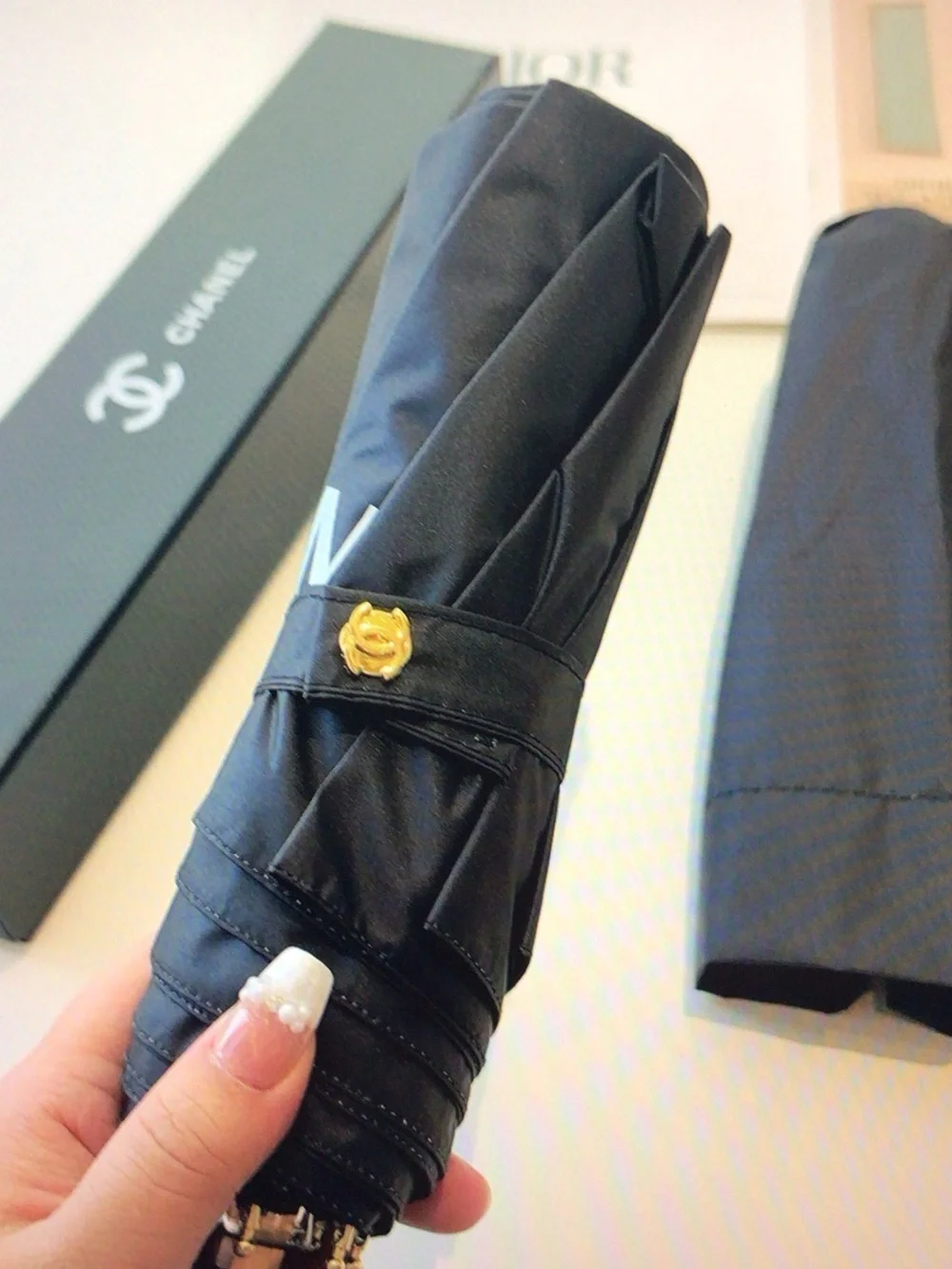CHANEL Black Compact Umbrella with Blue Rose Handle